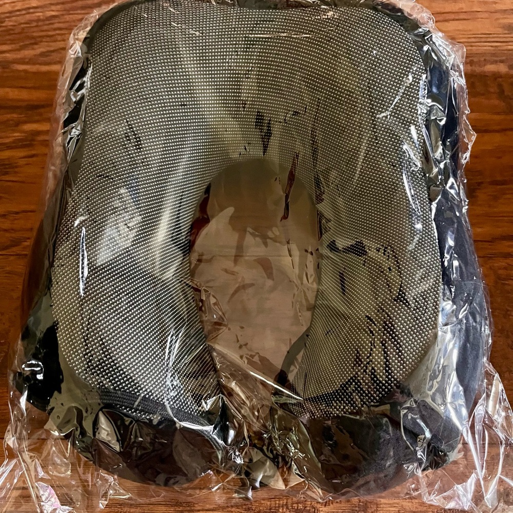 Neck pillow with adjustable strap by neck with very soft throw blanket